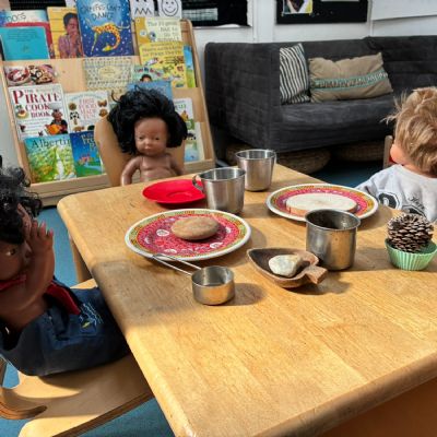 The dolls are ready for lunch.