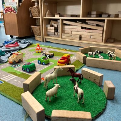 The farm animals, cars, and trucks